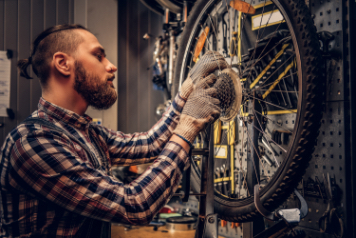 guy repairing bike